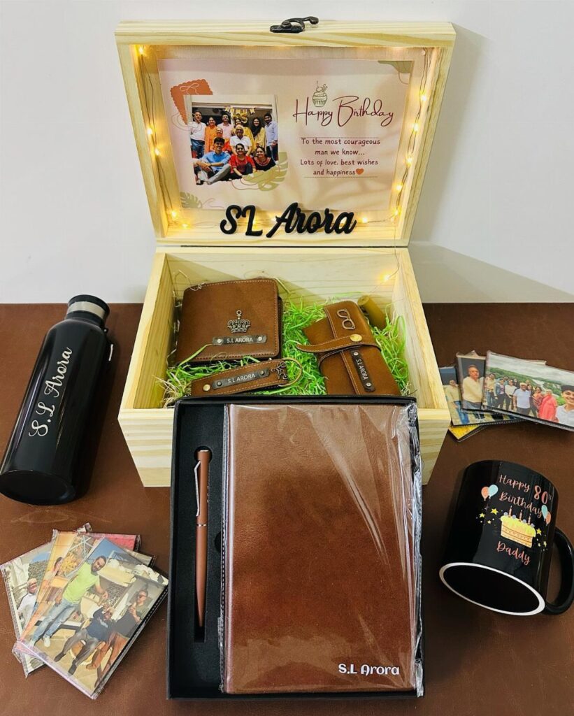 Personalized birthday gift set for a man featuring leather goods and engraved accessories.